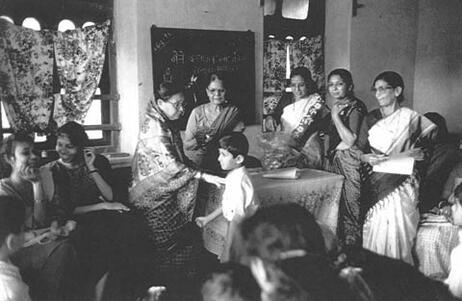 Members of Shri Mandal Distribute Presents in Bombay