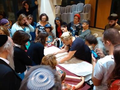 Sewing together sheets of parchment