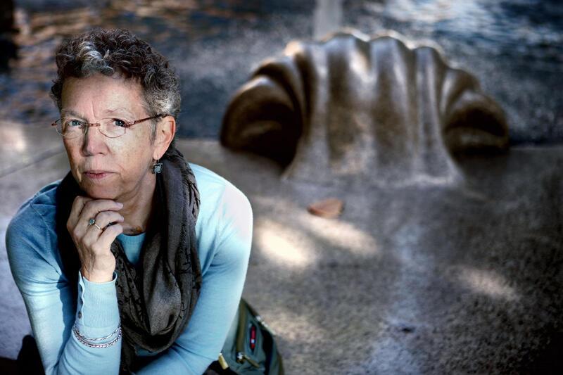 Deborah Dash Moore seated looking at camera with hand under chin