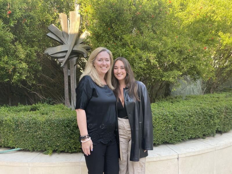 Two women standing outside a synagogue