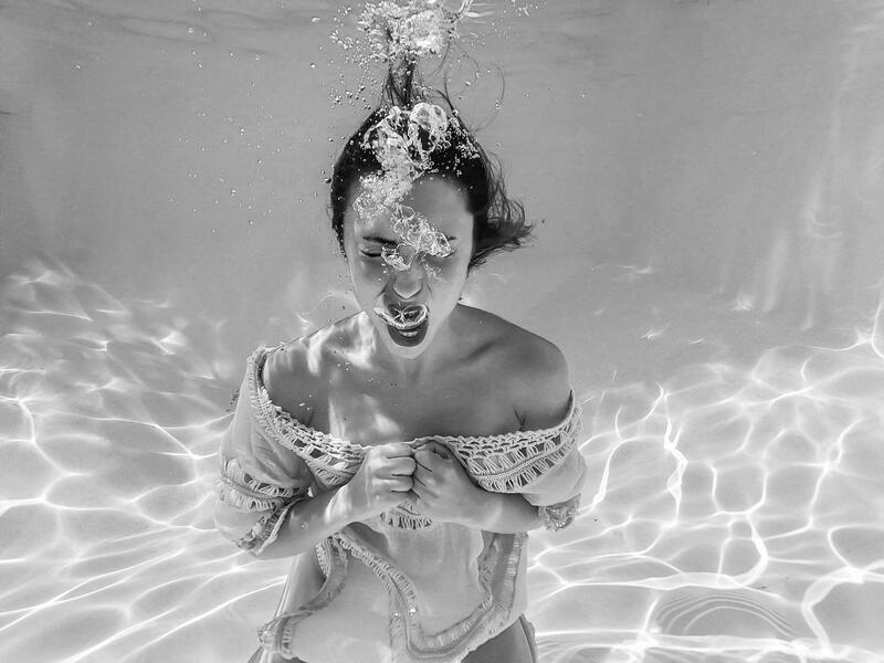 woman screaming underwater