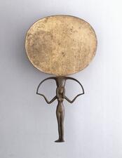 Mirror made of silver and copper alloy. Nude female figure-handle with vivid dark green patina with some brown areas. 