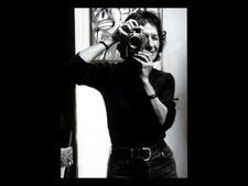 Marti Friedlander taking a self-portrait in a mirror