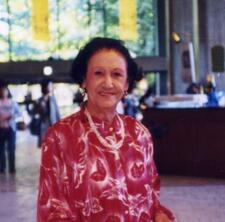 Sulamif Messerer in red shirt as an older woman.
