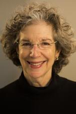 Headshot of Riv-Ellen Prell smiling wearing a black top