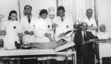 Nurses and Doctors Treat a Child in the Ghetto, Bedzin, Poland Nurses and Doctors Treat a Child in the Ghetto, Bedzin, Poland