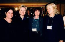 photograph of four women at a meeting