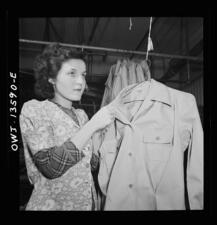 Jewish worker in a dress shop making blouses for the Women's Army Auxiliary Corps during WWII. 