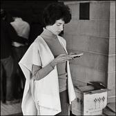 Arlene Agus Praying on Sukkot, 1976