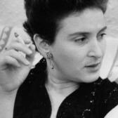 Adele Wiseman, looking off-camera and holding a cigarette