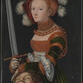 Judith, dressed in Renaissance clothing, holds a sword in one hand and the head of Holofernes in the other.