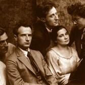 Three women and four men sitting together