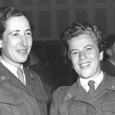 Shoshana Werner (left) and Shoshana Gershonowitz, both in uniforms, smiling for a photo.