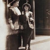 black and white photograph of two women in dresses