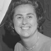 Rosalind Wyman at a reception honoring State Supreme Court Justice Stanley Mosk, 1964. 