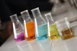 Chemistry beakers with colorful liquid