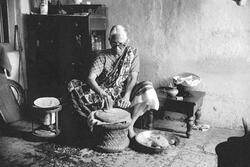 Woman Baking Bread in Bombay