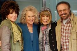 Carole Bayer Sager, Carole King, Cynthia Wil, and Barry Man standing together with their arms around each other