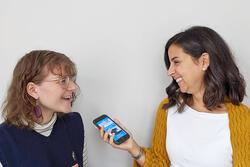 Two women using the Story Aperture app