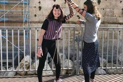 Maya Stutman-Shaw Wearing Tefillin with a Friend at the Western Wall