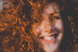 A woman with curly hair