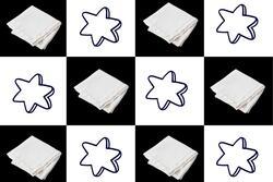 Black and white checkered stars and photo of folded napkin