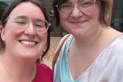 Two women wearing "I voted" stickers