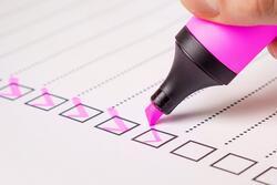 Checklist, checked boxes with a pink highlighter.