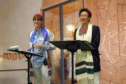 Two women on the bima at synagogue