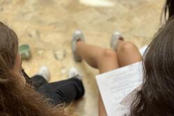 Over the Shoulder Picture of Fellows Reading a Handwashing Blessing at Mayyim Hayyim, RVF 2022 August Retreat 