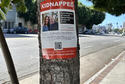 Sign that says Kidnapped and includes names and information about two Israelis kidnapped in Hamas attack on October 7