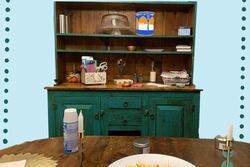 Collage of shelf and candles on blue background