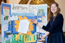 2016-2017 Rising Voices Fellow Molly Pifko with her Bat Mitzvah Project Display