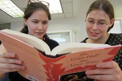 Women Study a Book