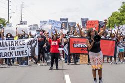 Tarece Johnson leading a Justice for Black Lives march she organized in Atlanta, June 7, 2020