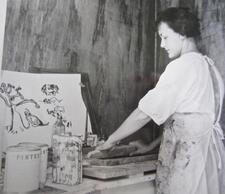 black and white image of a woman printmaking