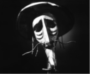 Film still from Story of a Doll, black and white