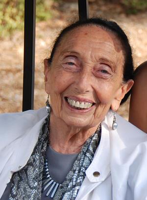 Cropped photo of Yehudit Arnon, sitting outdoors