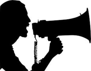 Woman speaking into a megaphone