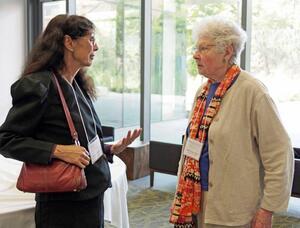 color photograph of a two women speaking