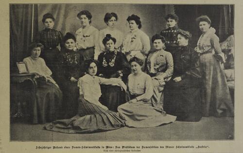 Antonie Graf and a group of women posing in lines in a parlor