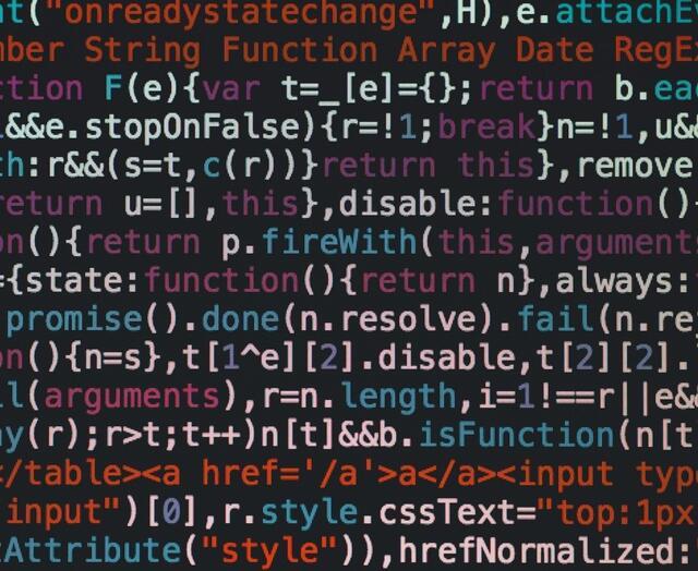Close-up photo of computer code.