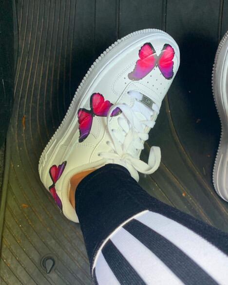 Sneaker with butterflies on it