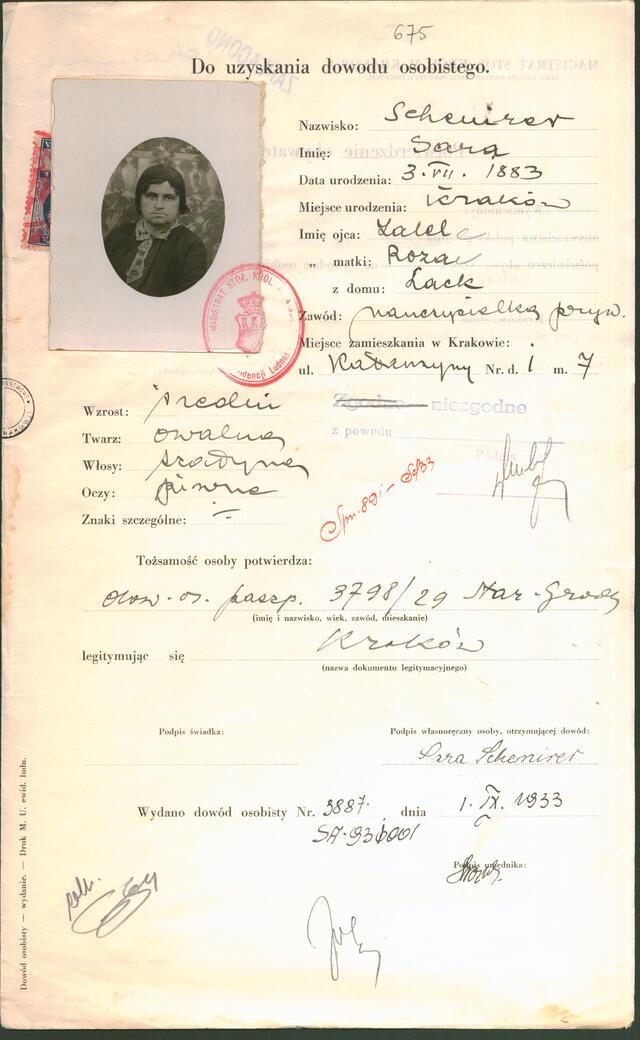 A form, printed in Polish with handwritten responses. A small black and white photo is in the upper lefthand corner and there is a red stamp.
