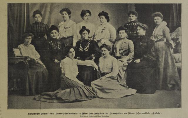 Antonie Graf and a group of women posing in lines in a parlor
