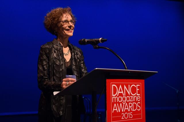 Wendy Perron standing at a podium