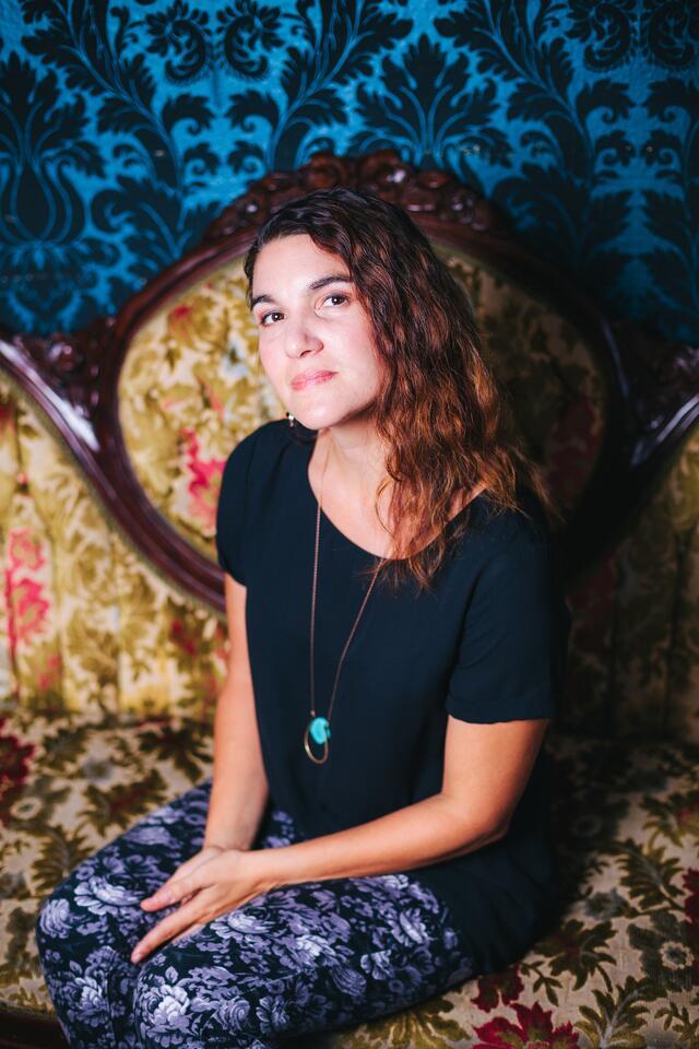 Alicia Jo Rabins seated