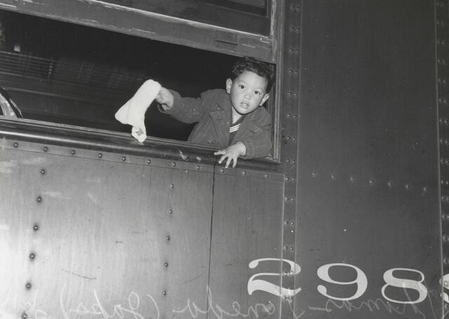 Tommy Yoneda on train to Manzanar