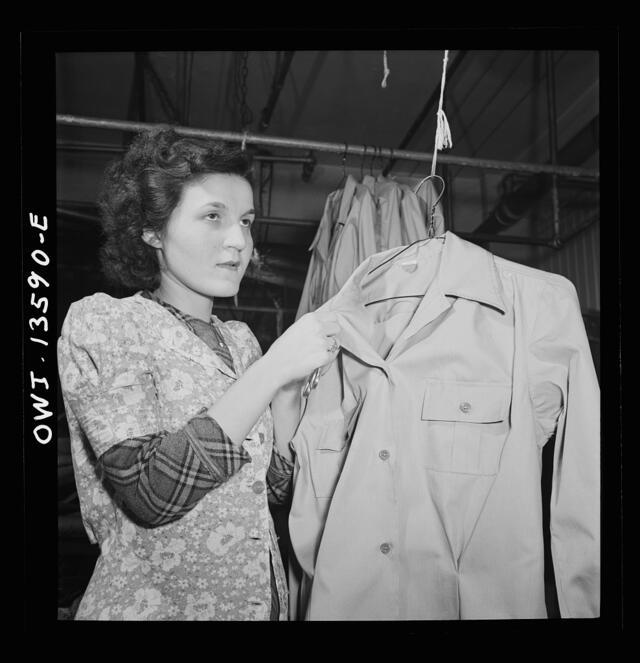 Jewish worker in a dress shop making blouses for the Women's Army Auxiliary Corps during WWII. 